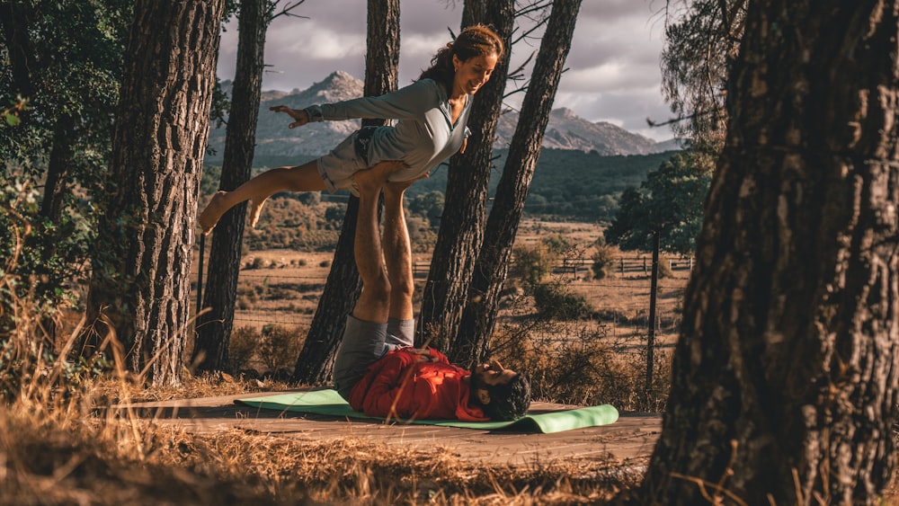 man lifting woman