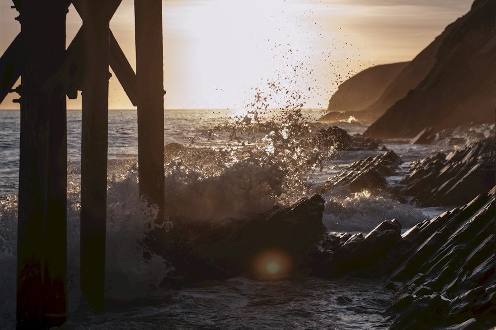 water splashed on rock