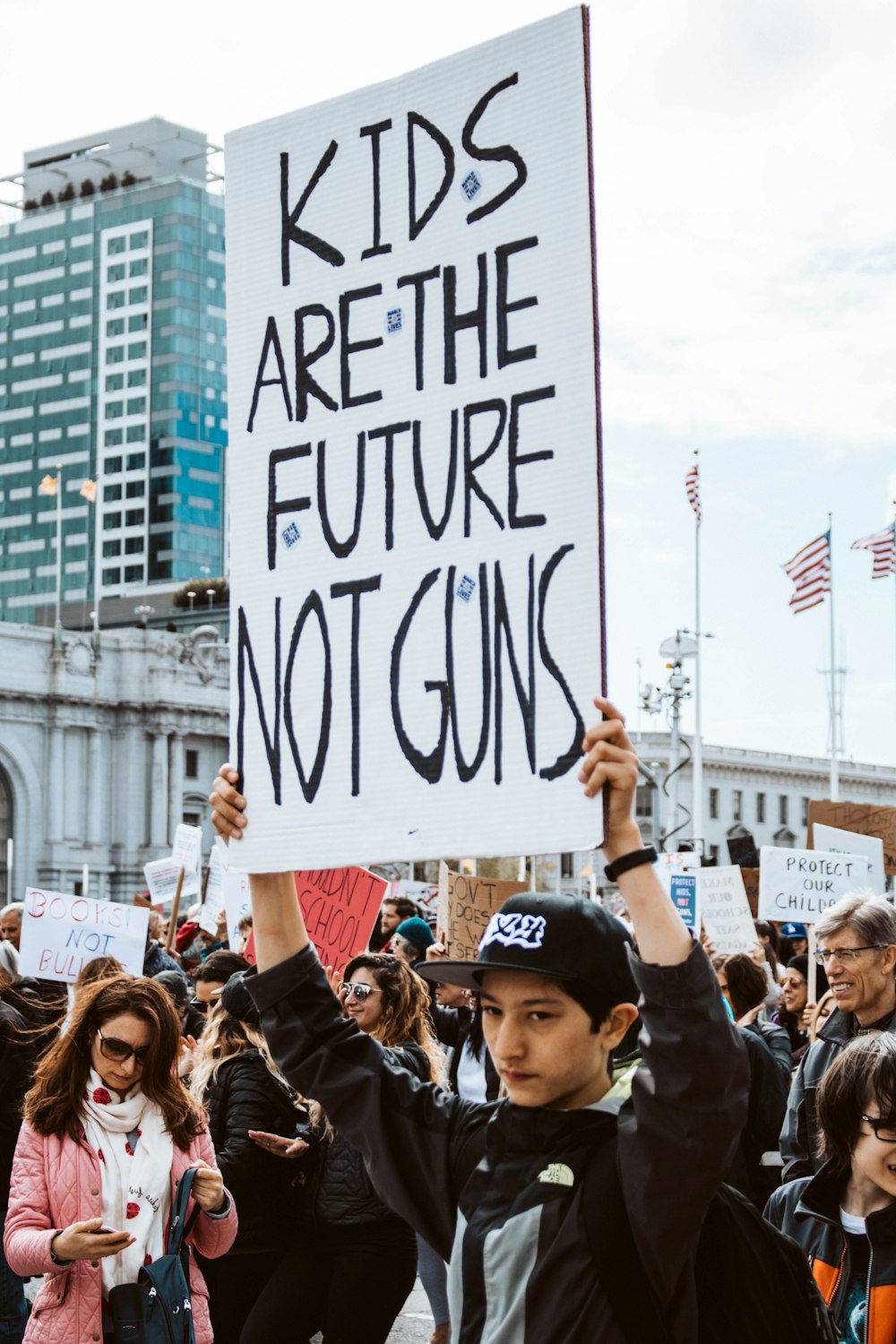 person holding up signage