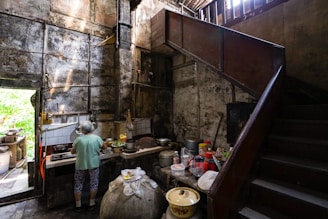 A rustic farmhouse kitchen where laktec sauerkraut is being prepared by hand.