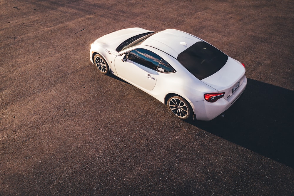 high-angle view of white coupe