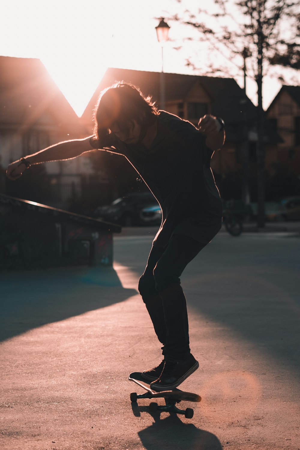 man skateboarding on pavement