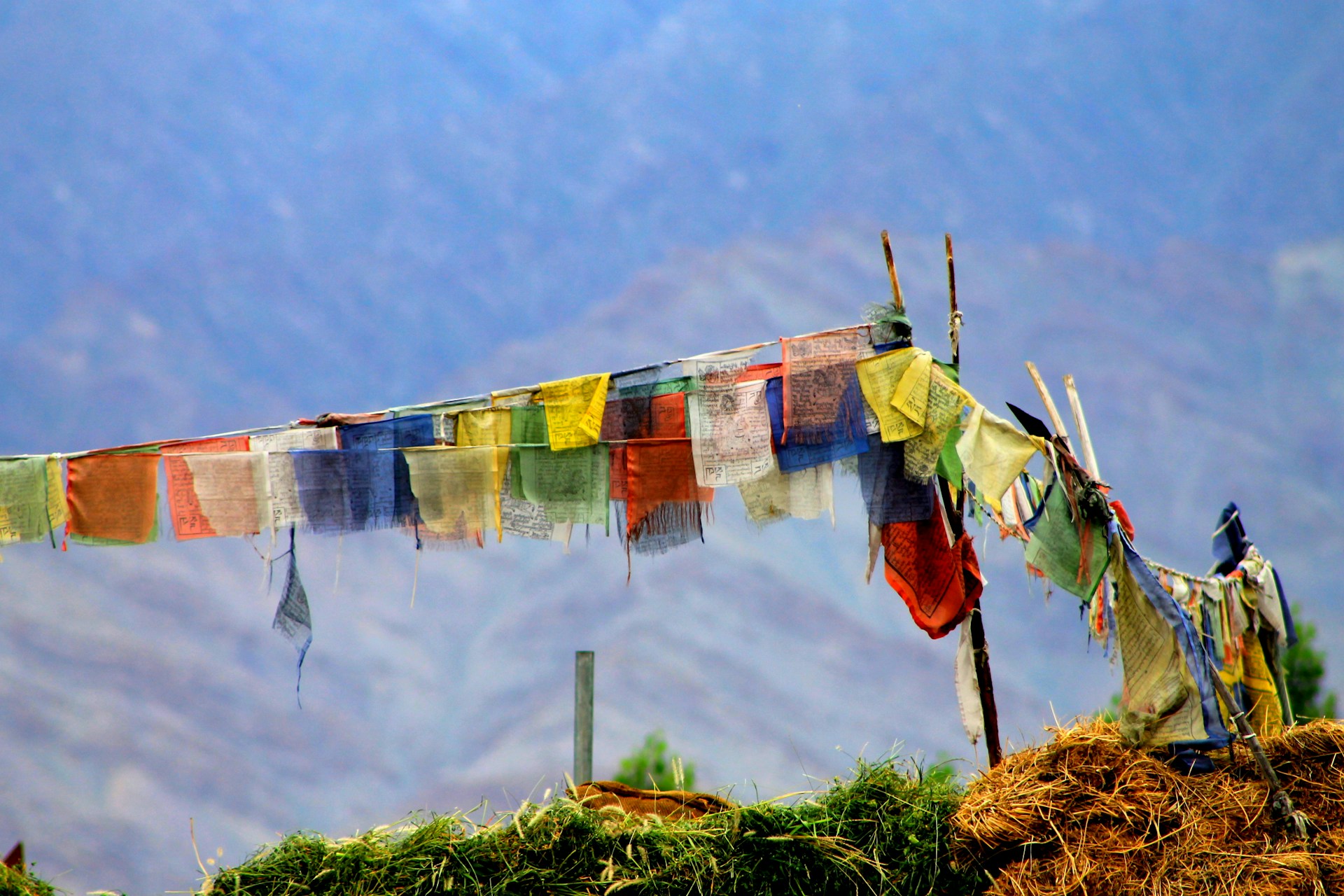 several textiles hanging on wire
