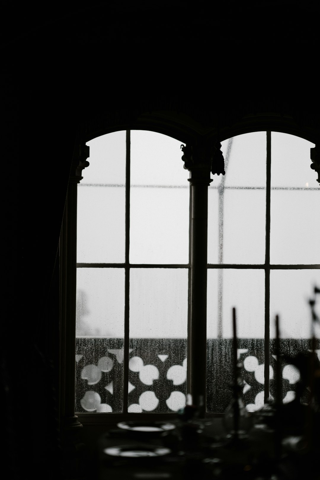 grayscale photo of closed window