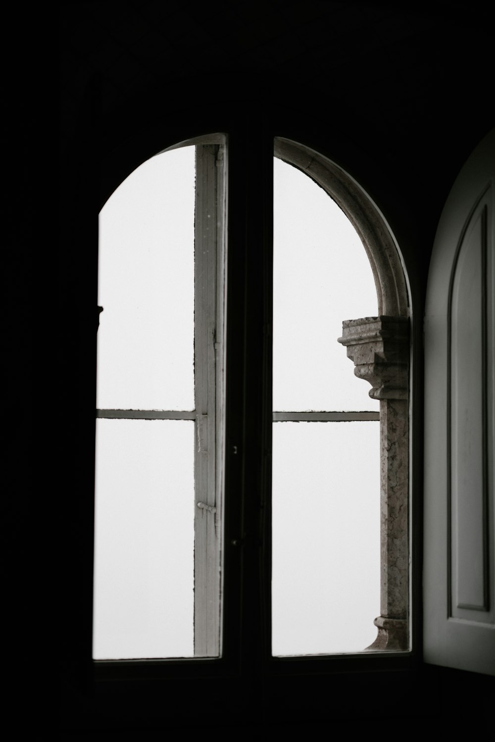 opened window door inside dark room