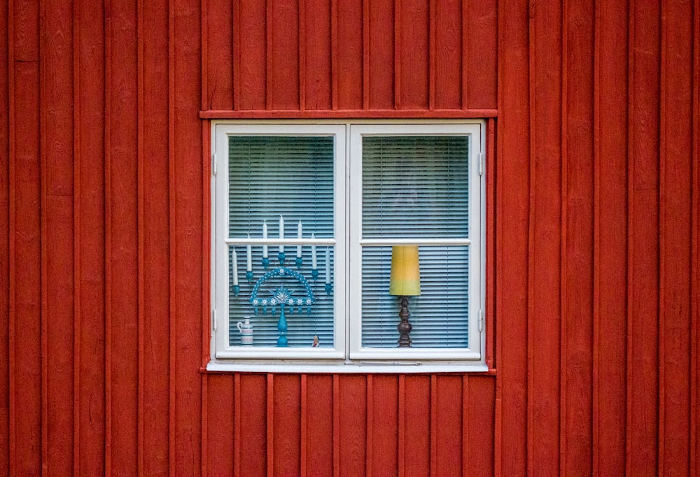 blue candelabra through glass window