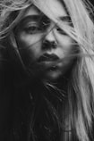grayscale photography of woman's face