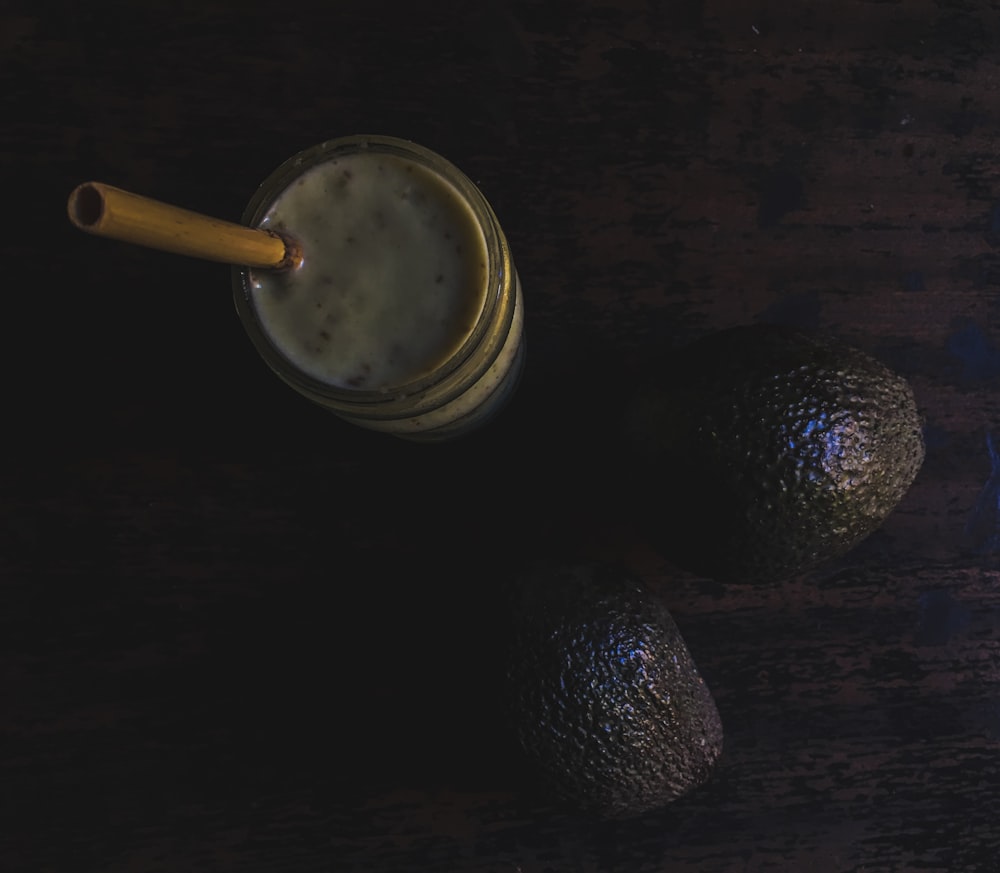 avocado drink placed on wood