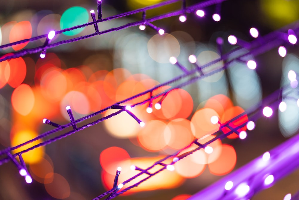 Fondo de pantalla bokeh naranja y morado