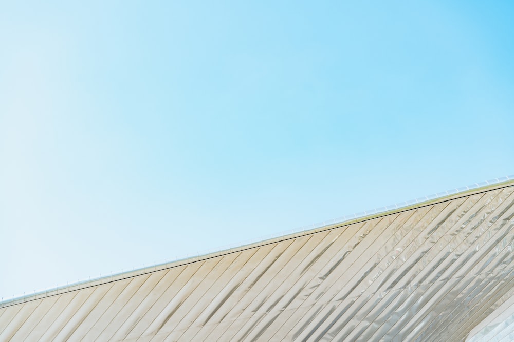 white roof under clear blue sky