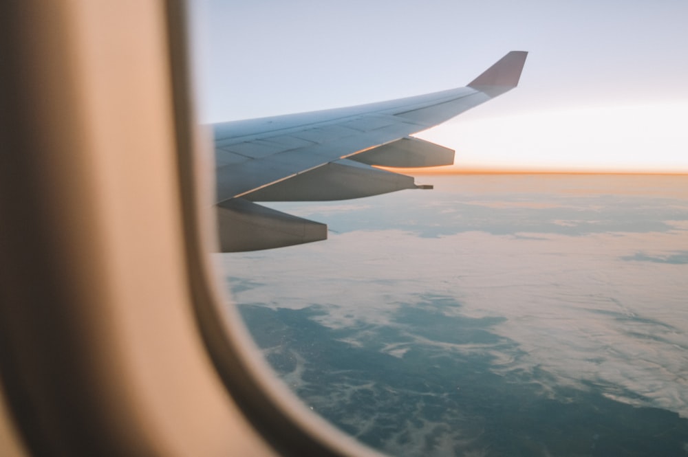 view of clouds through airplane's window