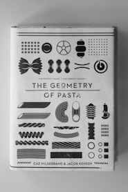 The Geometry of Pasta book on white surface