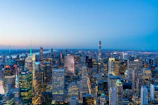 A panoramic view of a bustling city skyline symbolizing global talent connections.