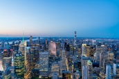 A panoramic view of a bustling city skyline representing economic growth and opportunity.