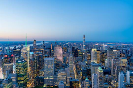 A panoramic view of a bustling city skyline symbolizing global talent connections.