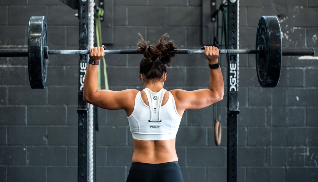 woman doing weight lifting