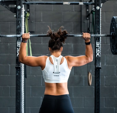 woman doing weight lifting