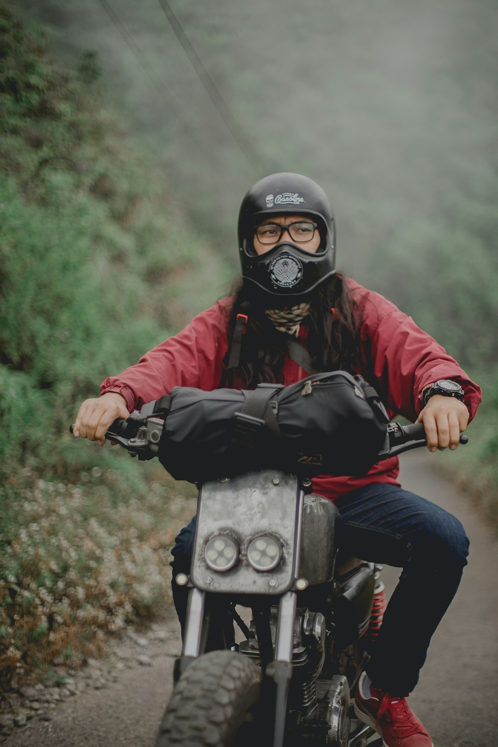 person riding on motorcycle