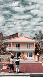 Exterior of Casa Sisiguaca Santa Marta with tropical plants and inviting entrance.