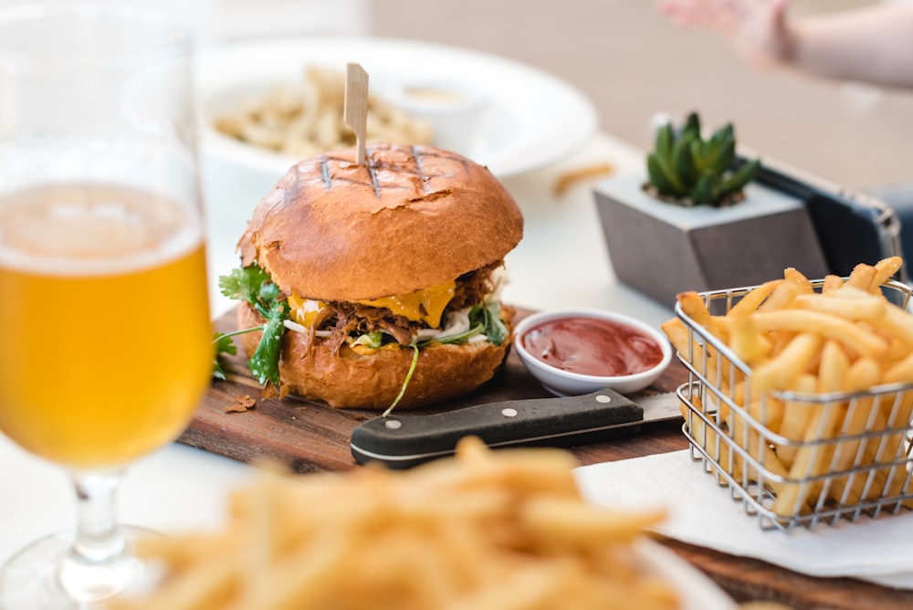 selective focus photography of burger and fries