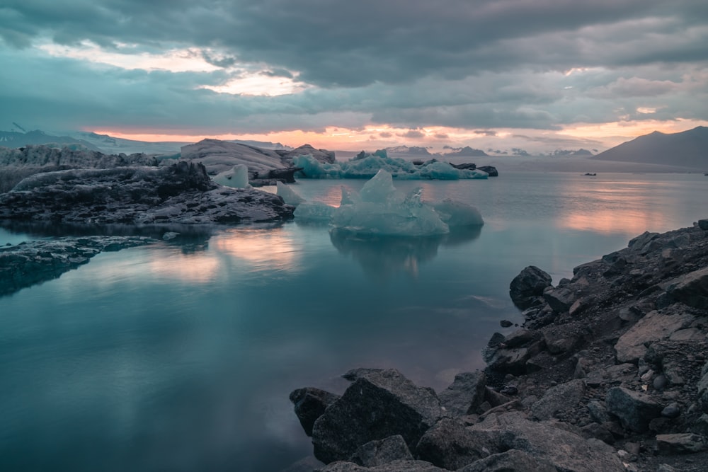 ice berg in body of water