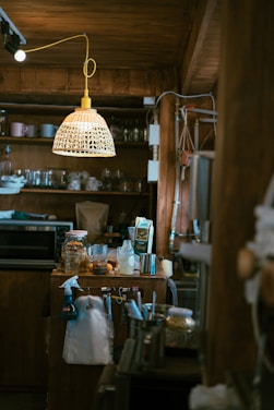 A cozy kitchen scene featuring modern utensils and neatly arranged household items.