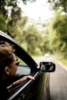 woman sitting inside vehicle