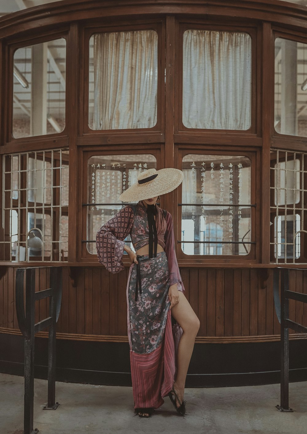 woman standing in front of display counter