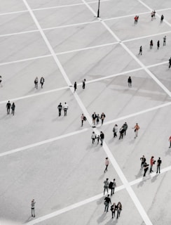 group of people standing on open field