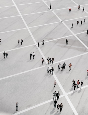 group of people standing on open field