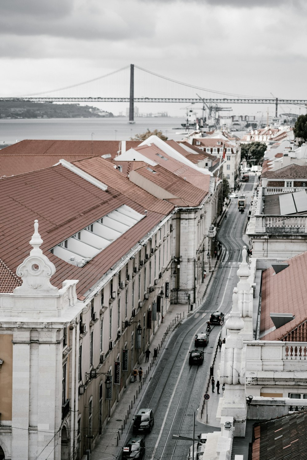 a view of a city with a bridge in the background