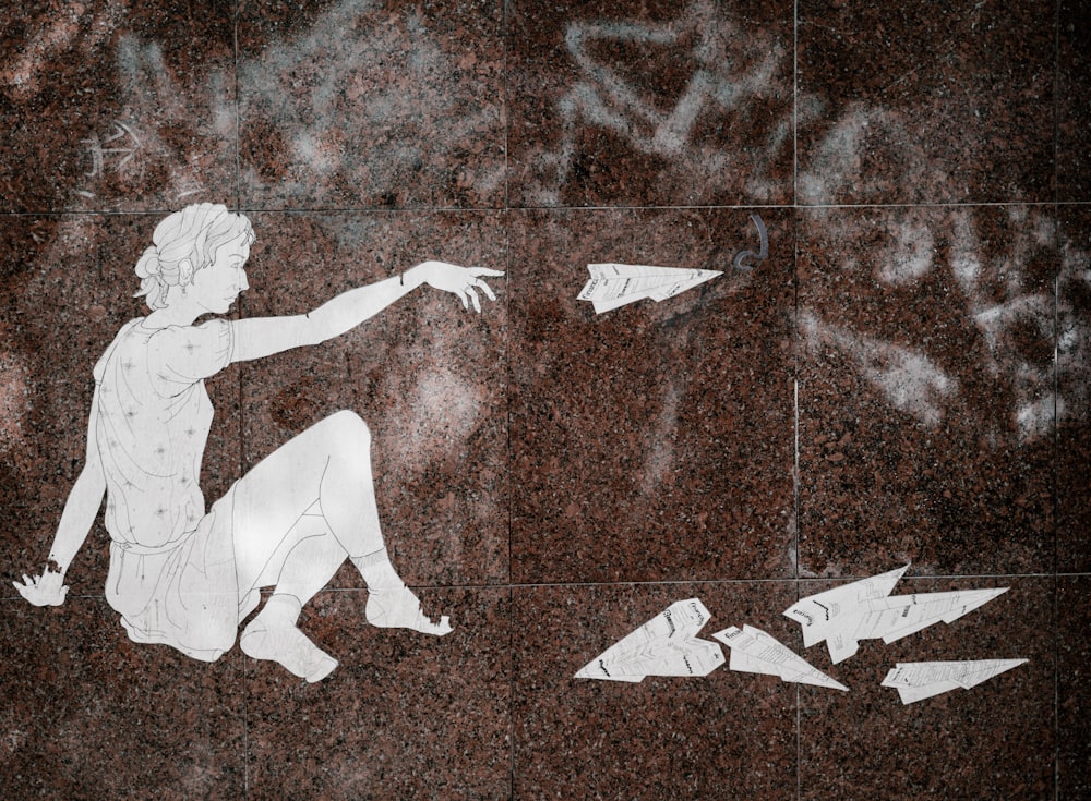 man throwing arrowhead stone illustration