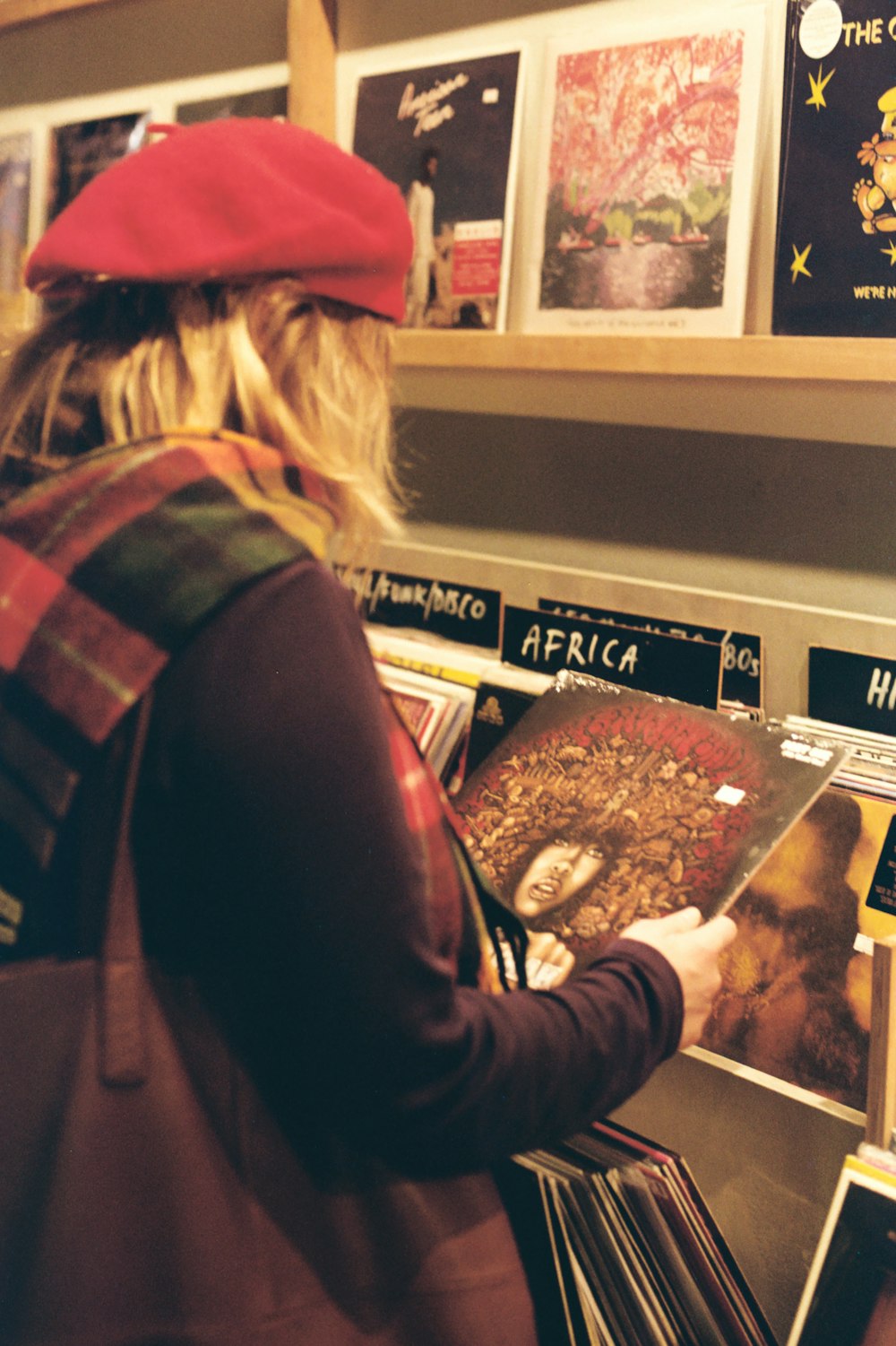 woman holds books