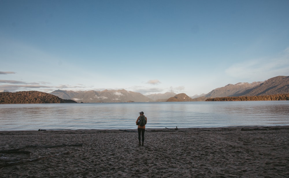 man stands in beach