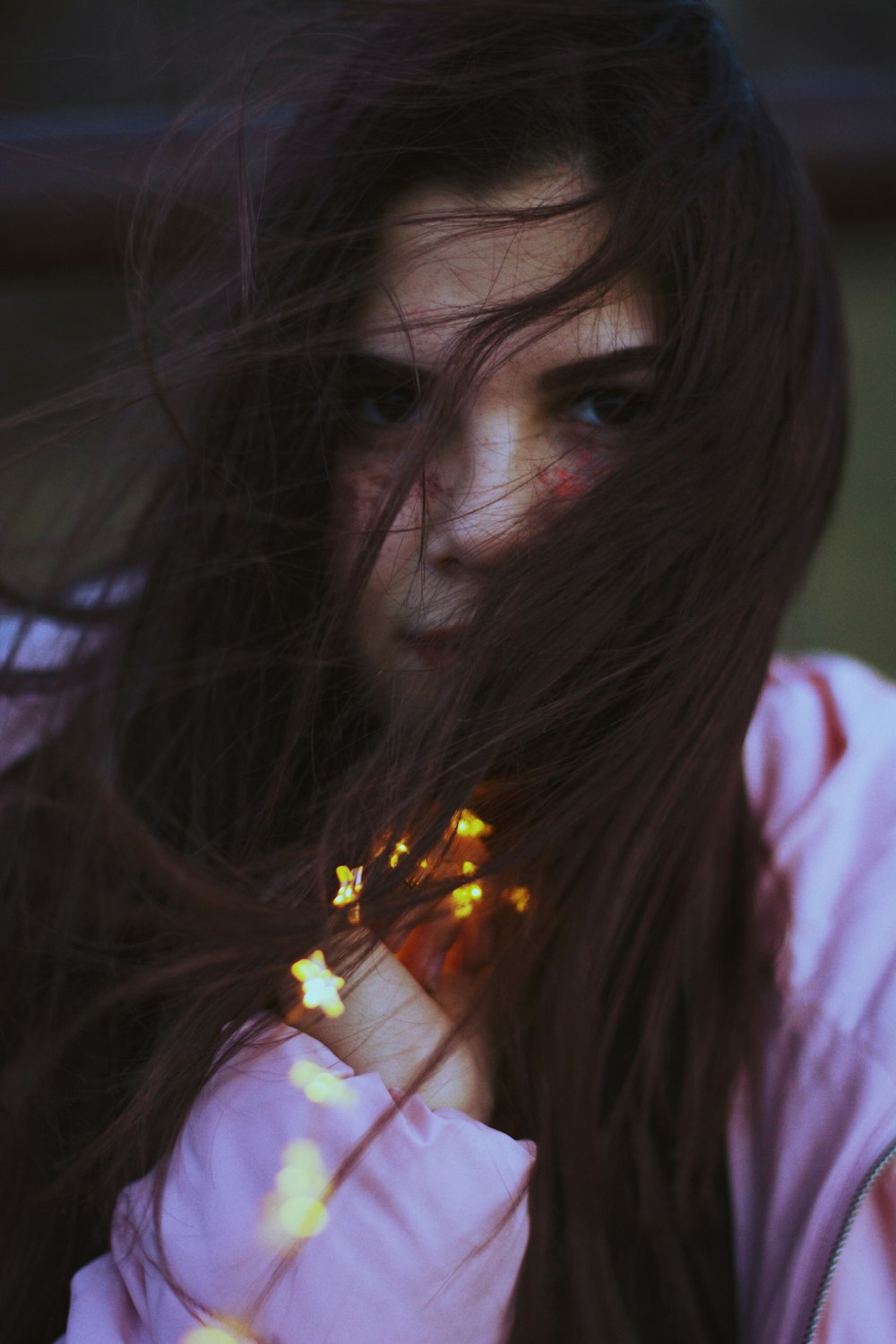 girl wearing pink jacket close-up photography