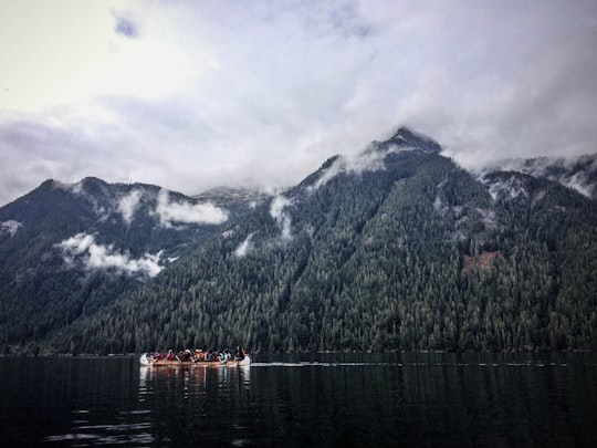 people on the boat near mountains in Chilliwack Canada