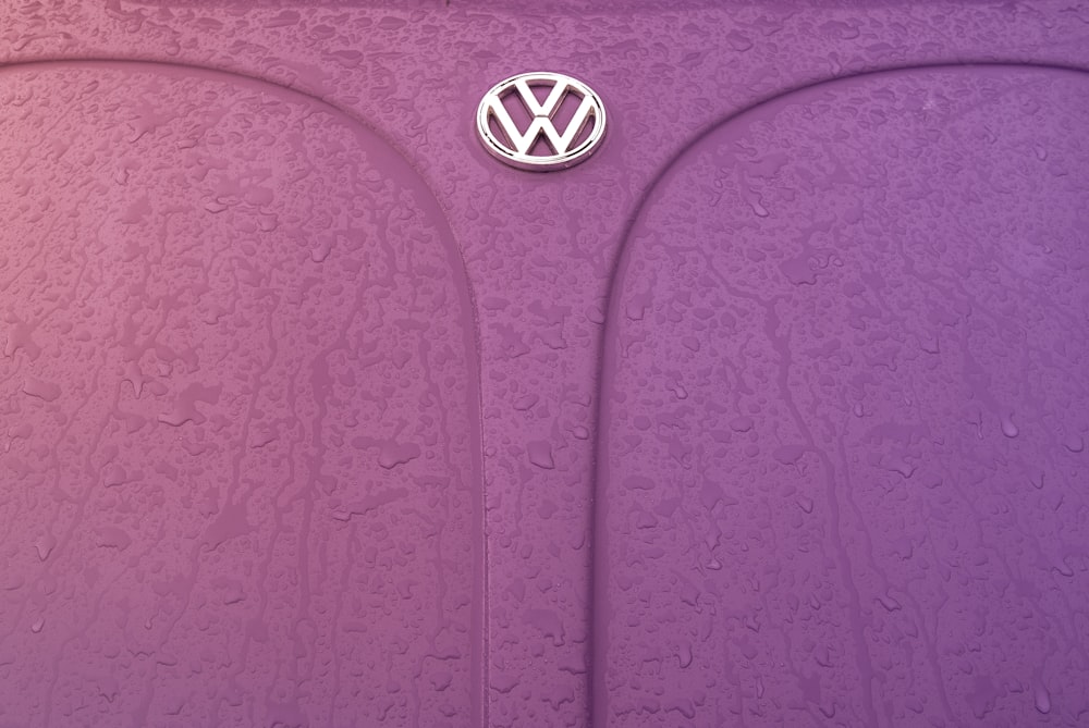 pink Volkswagen Beetle hood