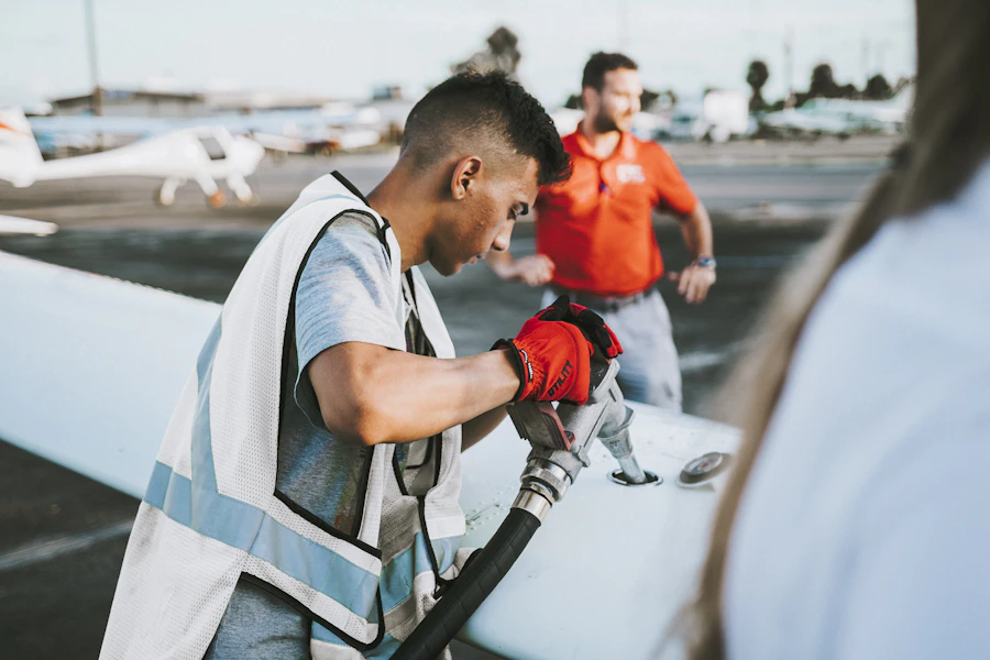 Line technician fueling an aircraft
