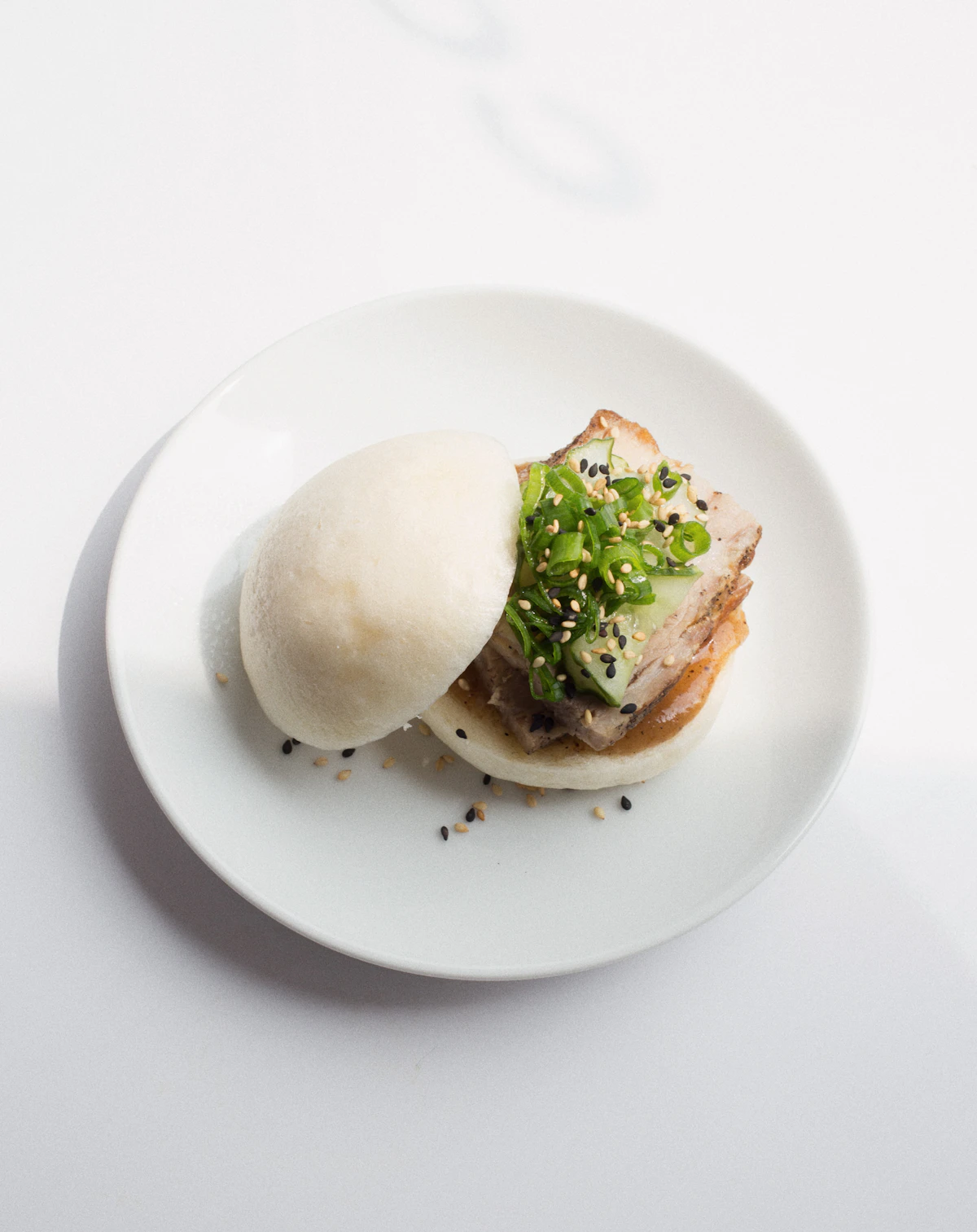 Burger on a plate with toppings