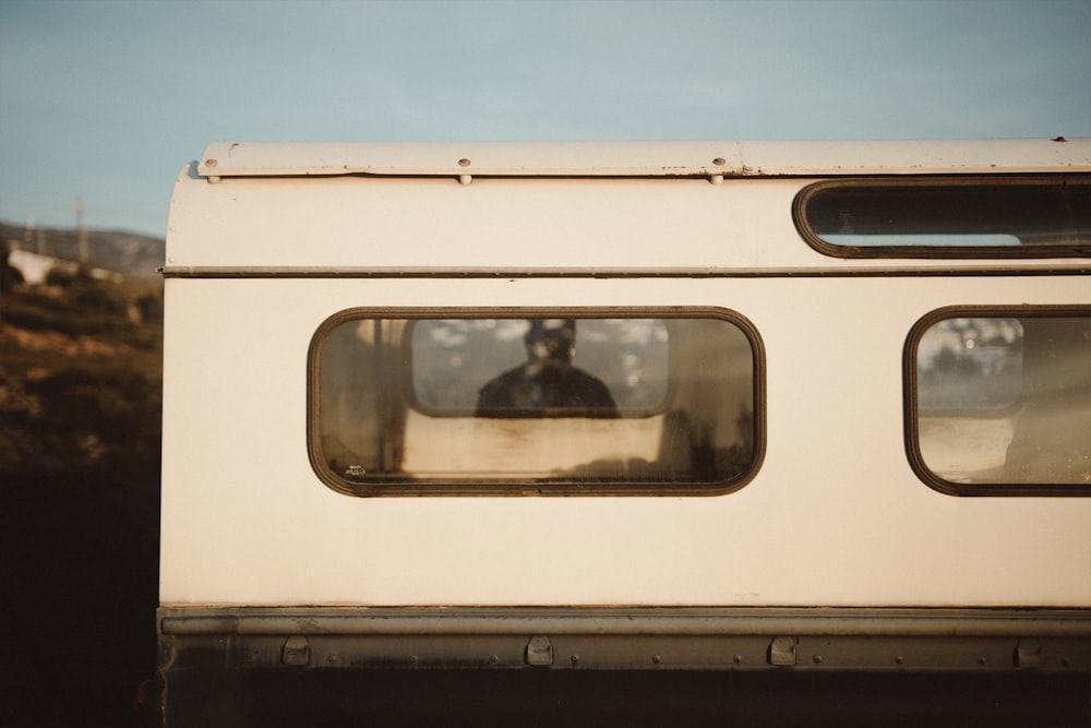 white vehicle camper shell