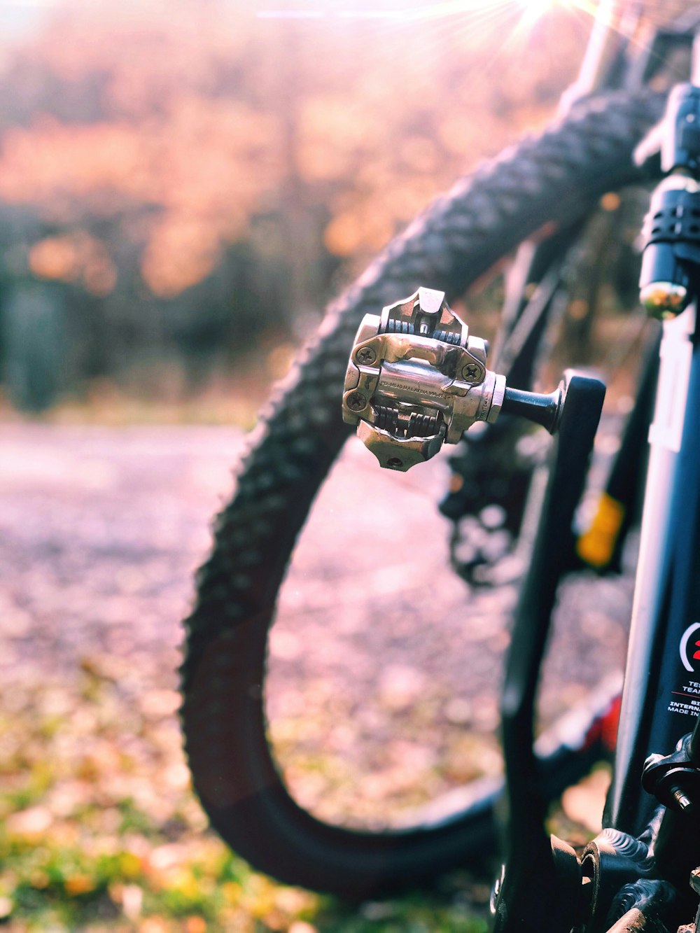 selective focus photography of road bike crankset