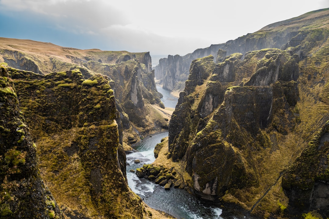 aerial photography of cliffs, One of the many green canyons you will come across in Iceland