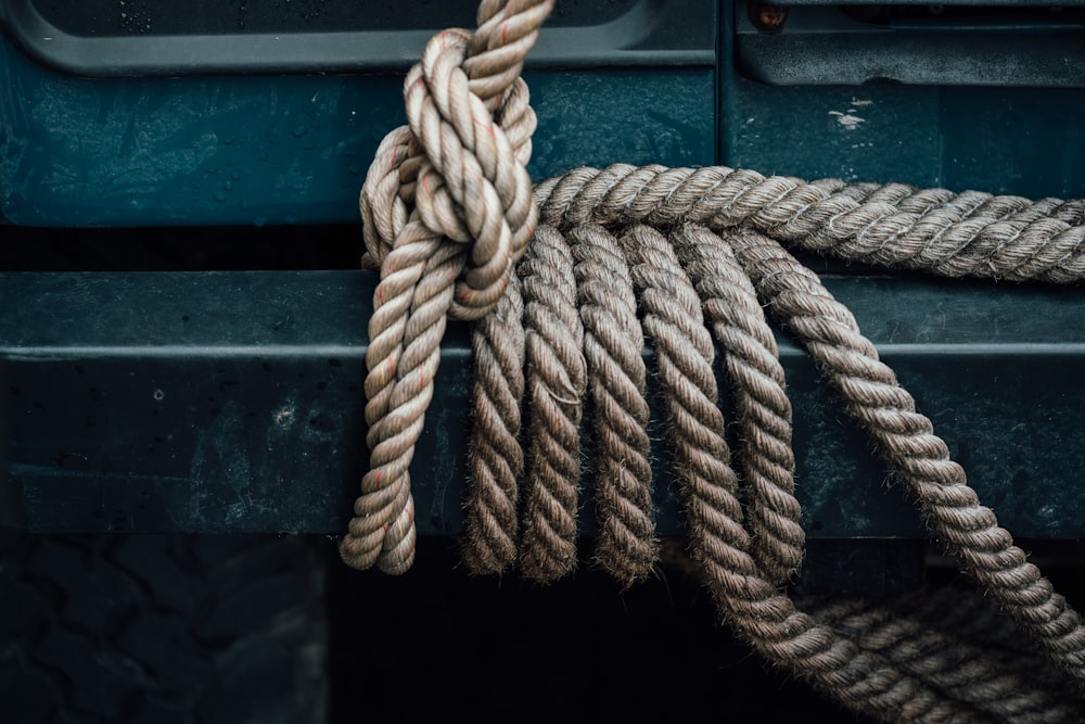 brown rope tied to vehicle