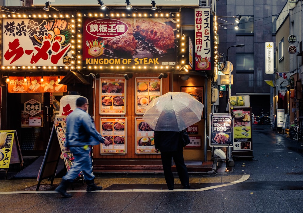 man looking at food menu store