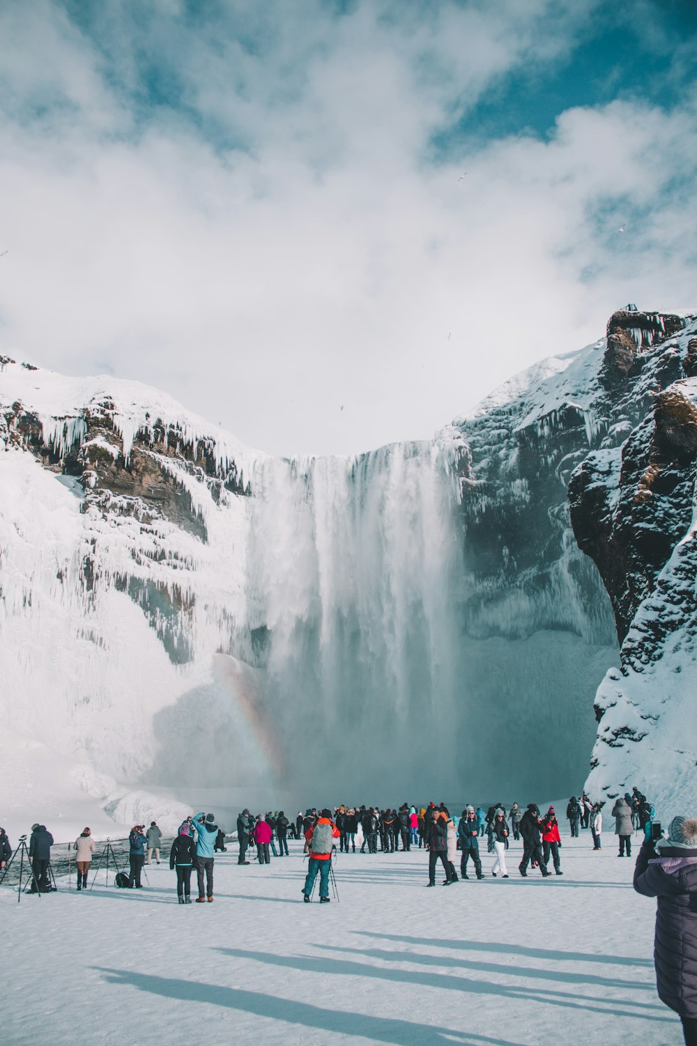 waterfalls surrounded with snow