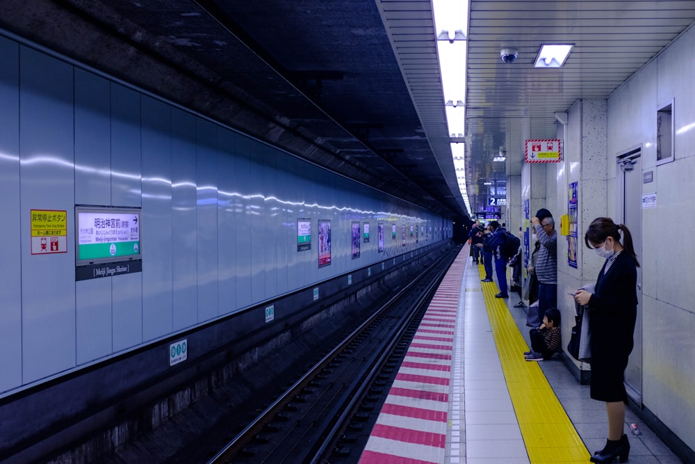 people on train station