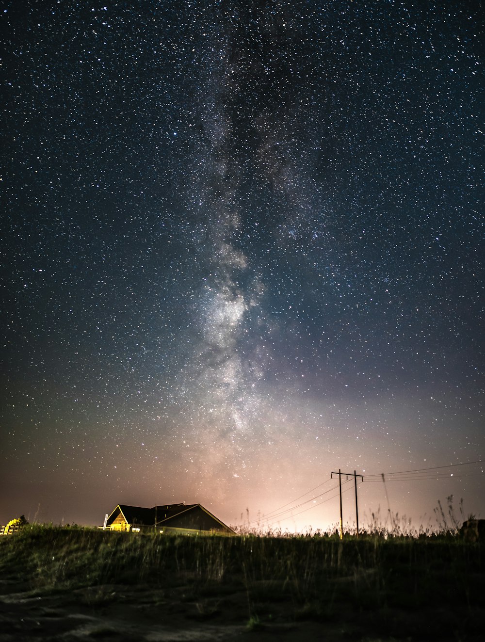 house and transmission tower