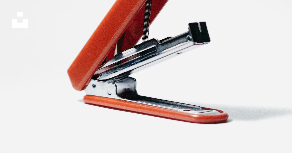 Orange stapler opened photo – Free Red Image on Unsplash