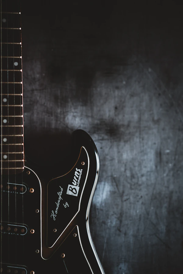 Close-up of hands playing an acoustic guitar
