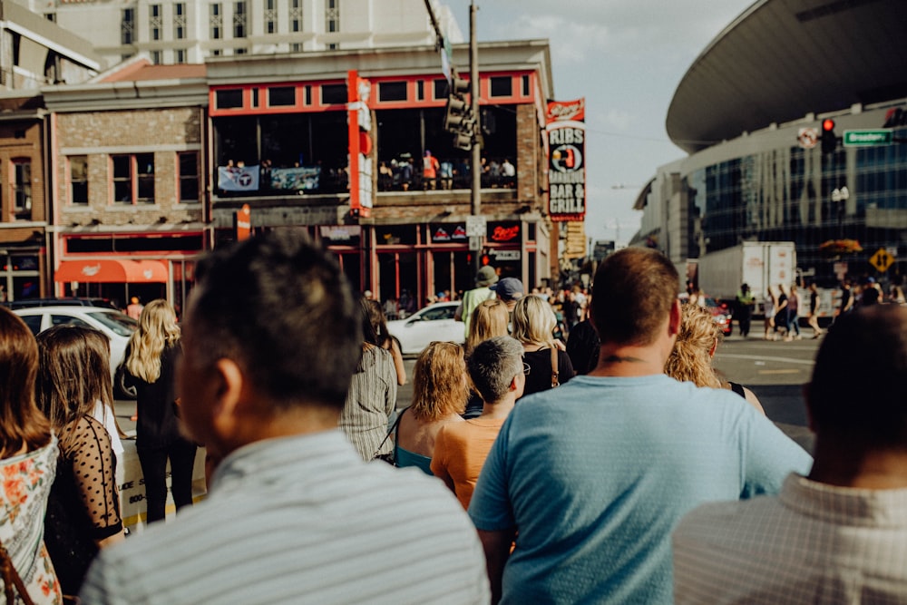 people walking on pedestrian lane during daytime